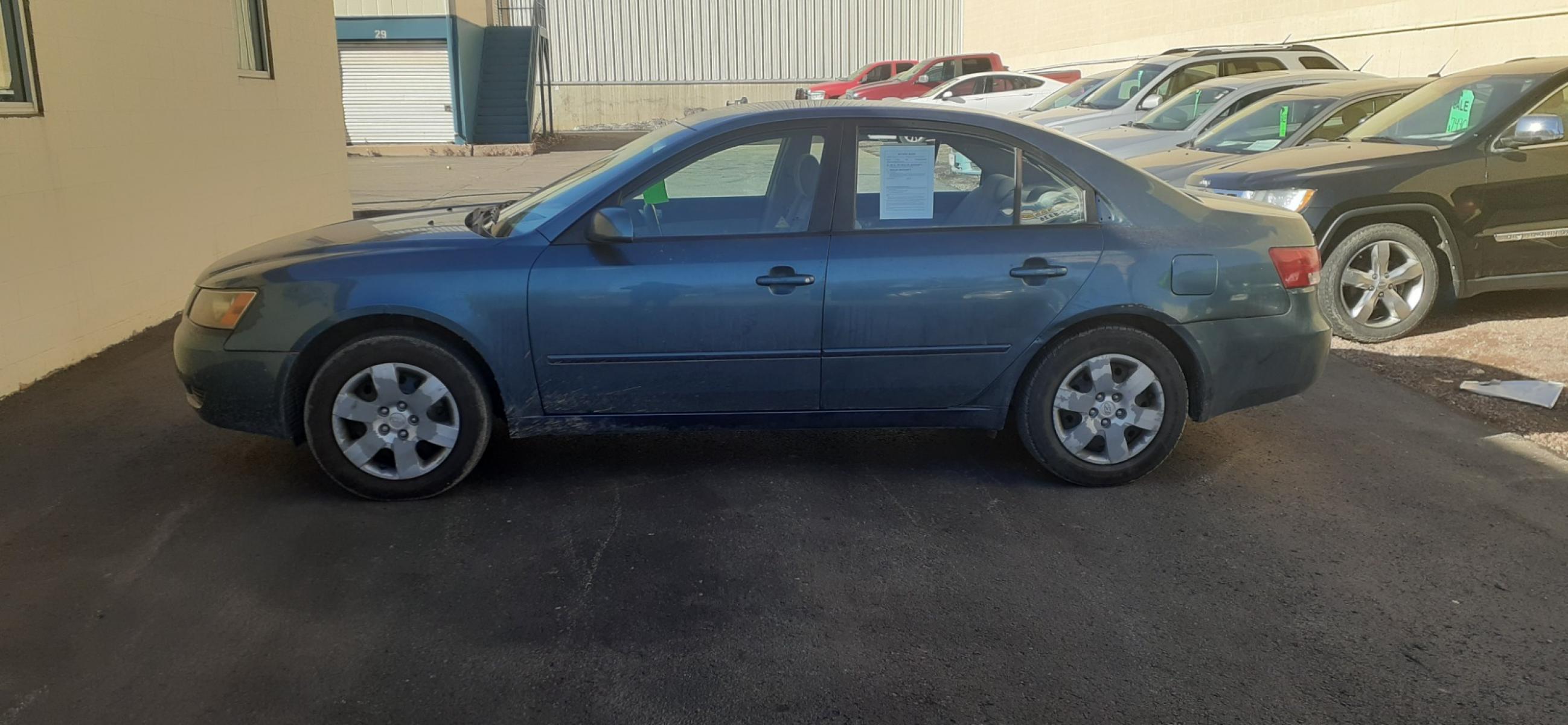 2006 Hyundai Sonata (KMHET46C36A) with an L4, 2.4L engine, 5-Speed Manual transmission, located at 2015 Cambell Street, Rapid City, SD, 57701, (605) 342-8326, 44.066433, -103.191772 - CARFAX AVAILABLE - Photo #0